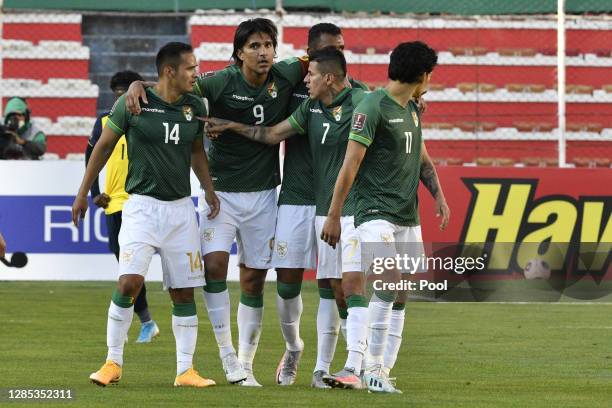 Marcelo Martins of Bolivia celebrates with teammates after scoring the second goal of his team during a match between Bolivia and Ecuador as part of...