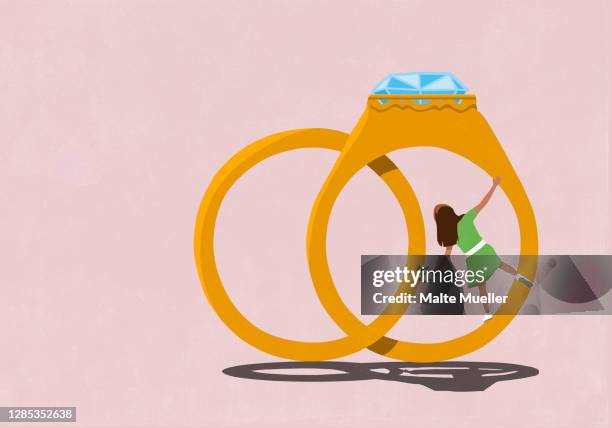 illustrazioni stock, clip art, cartoni animati e icone di tendenza di happy young woman hanging from engagement ring - anello gioiello