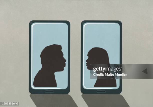 silhouette couple kissing on separate smart phone screens - キス　女性点のイラスト素材／クリップアート素材／マンガ素材／アイコン素材