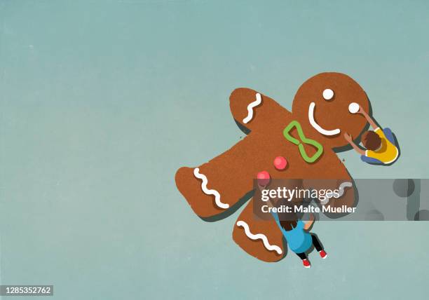 ilustrações, clipart, desenhos animados e ícones de boy and girl assembling gingerbread man - homem de gingerbread