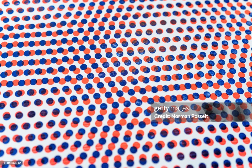3D red and blue dots pattern overlapping on white background