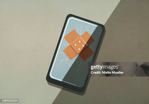 bandage over cracked smart phone screen - bandage stock illustrations