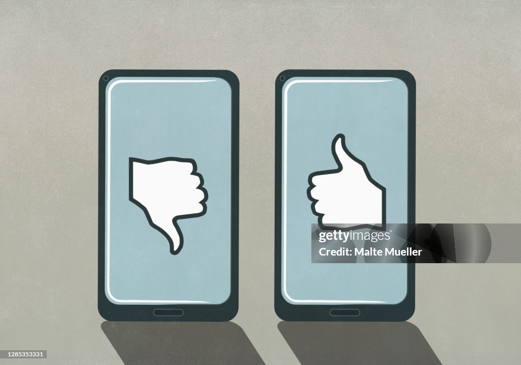 Thumbs up and thumbs down symbols on smart phone screens