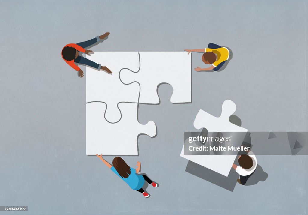 Kids finishing puzzle with missing piece