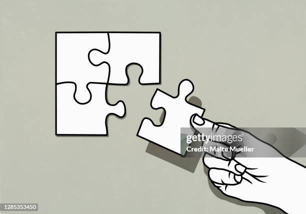ilustrações de stock, clip art, desenhos animados e ícones de hand finishing jigsaw puzzle with missing piece - puzzle