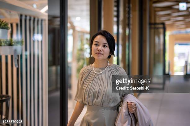 businesswoman walking in city - career path stock pictures, royalty-free photos & images