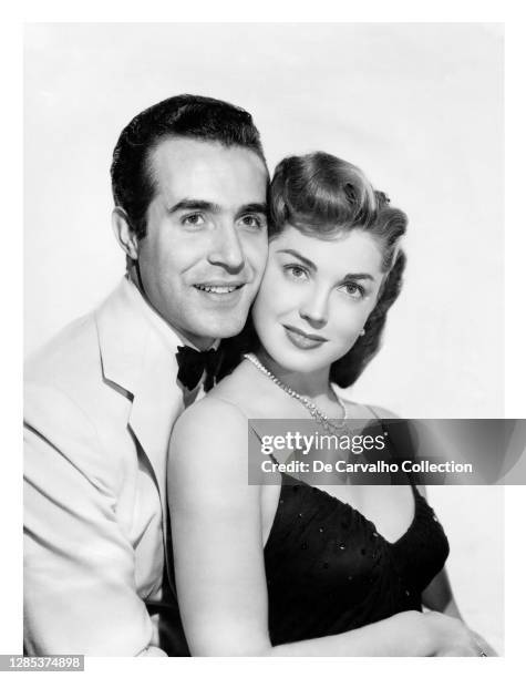 Mexican Actor Ricardo Montalban as ‘Jose O’Rourke’ tenderly embraces Actress and Swimmer Esther Williams as ‘Eve Barrett’ in a publicity shot from...