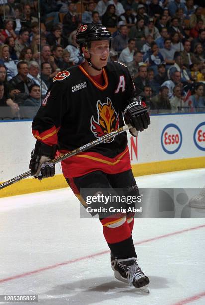 Valeri Bure of the Calgary Flames skates against the Toronto Maple Leafs during NHL game action on October 30, 1999 at Air Canada Centre in Toronto,...