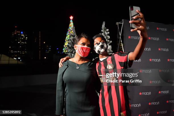 Atlanta Mayor Keisha Lance Bottoms and her son Langston Bottoms attend the 2020 Macy's Atlanta Great Tree Lighting Ceremony at Macy's Lenox Square on...