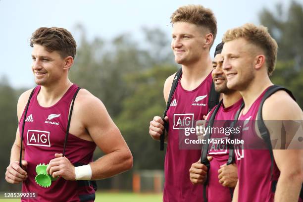 Beauden Barrett, Jordie Barrett, Richie Mo'unga and Damian McKenzie poses for a group photo during a New Zealand All Blacks training session at...