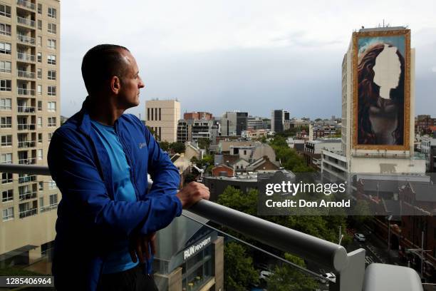 Man ponders the identity of the subject of the portrait from his apartment inside the Zenith building in late afternoon on November 13, 2020 in...