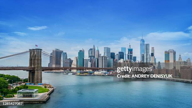 manhattan financial district. aerial view. - brooklyn bridge stock-fotos und bilder