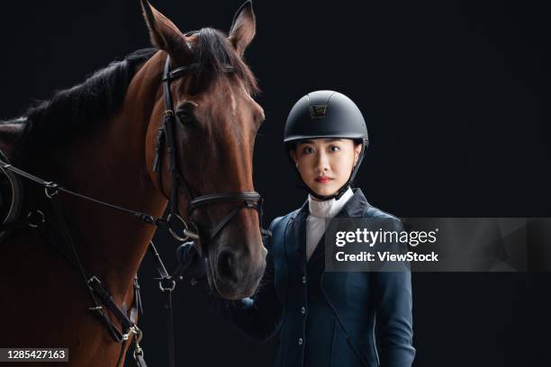 the horse image of the handsome young woman - 騎手 ストックフォトと画像