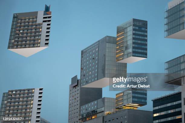 building blocks levitating in the city during blue hour like 3d puzzle. - business transformation stock pictures, royalty-free photos & images