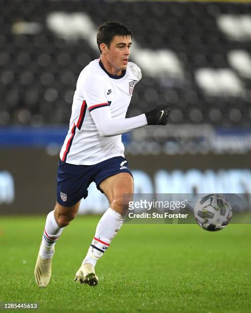 Player Giovanni Reyna in action during the international friendly match between Wales and the USA at Liberty Stadium on November 12, 2020 in Swansea,...