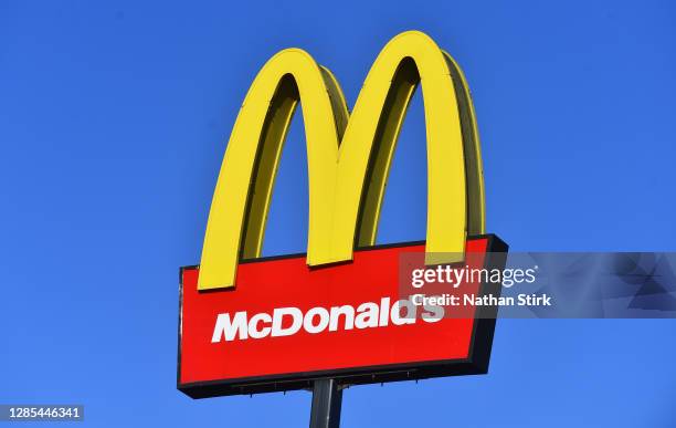 The American fast food company, McDonalds logo is seen outside one of its stores on November 13, 2020 in Stoke-on-Trent, Staffordshire .