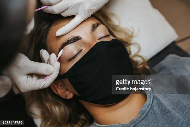 eyebrow rejuvenation - brow lamination stock pictures, royalty-free photos & images