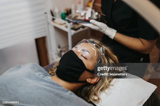 eyebrows lamination - brow lamination stock pictures, royalty-free photos & images