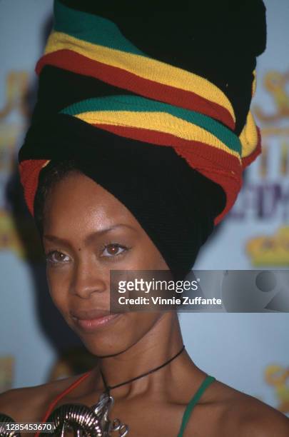 American singer-songwriter Erykah Badu, wearing a headwrap in green, gold and red, attends the 4th Annual Soul Train Lady of Soul Awards, held at the...