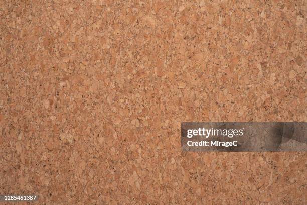 mottled brown cork texture - sughero foto e immagini stock
