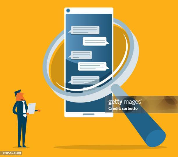 magnifying glass to find mobile information - fake news stock illustrations