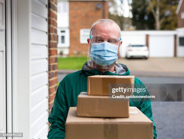 Deliver Rider Mask 7,191 Delivery Driver Mask Stock Photos, High-Res Pictures, and Images ...