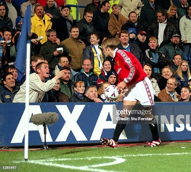 David Beckham of Manchester United blows a kiss to Chelsea supporter during the FA Cup quarter-final replay at Stamford Bridge in London. United won...