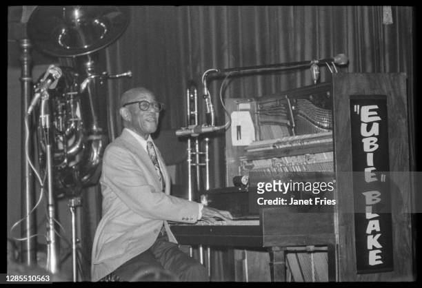 American Jazz composer and musician Eubie Blake plays piano as he performs onstage at the nightclub Earthquake McGoon's, San Francisco, California,...
