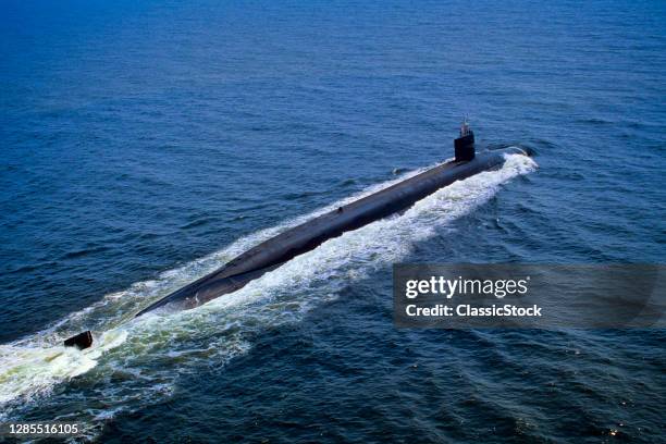 1990s USS Pennsylvania United States Navy Nuclear Powered Ohio-Class Ballistic Missile Submarine Cruising On Ocean Surface