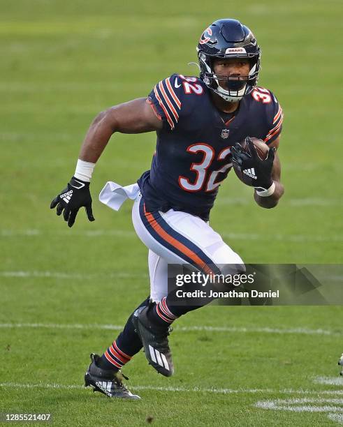 David Montgomery of the Chicago Bears runs against the New Orleans Saints at Soldier Field on November 01, 2020 in Chicago, Illinois. The Saints...