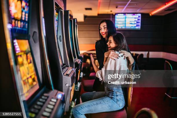 Slot Machine Player 1,541 People Playing Slot Machines Stock Photos, High-Res Pictures, and ...