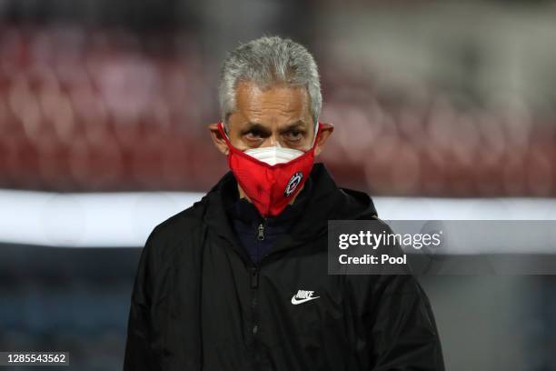 Reinaldo Rueda head coach of Chile wearing a protective mask looks on during a match between Chile and Peru as part of South American Qualifiers for...