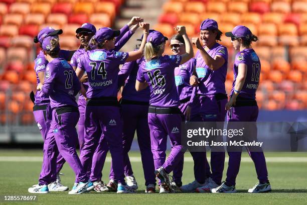 Amy Smith of the Hurricanes celebrates after taking the wicket of Erin Burns of the Sixers during the Women's Big Bash League WBBL match between the...