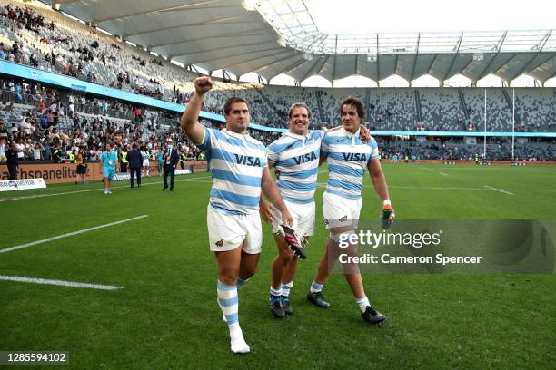 Francisco Gómez Kodela, Facundo Bosch and Santiago Grondona of Argentina celebrate after winning the 2020 Tri-Nations rugby match between the New...