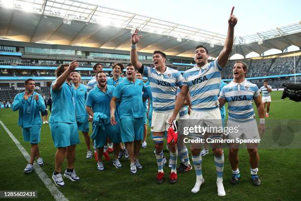 Guido Petti of the Pumas and Matias Alemanni of the Pumas celebrate with team mates after winning the 2020 Tri-Nations rugby match between the New...