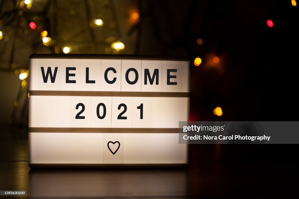 Light Box With Text Welcome 2021 New Year Concept With Christmas Light