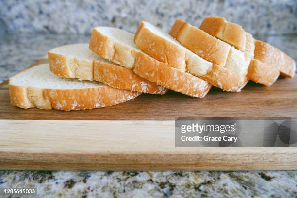 slices of bread - white bread stockfoto's en -beelden