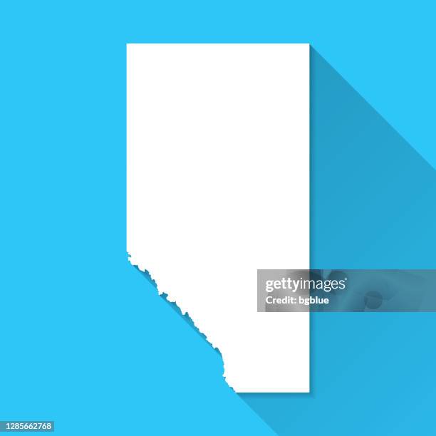 alberta map with long shadow on blue background - flat design - alberta stock illustrations
