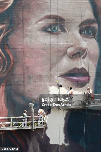 Finishing touches are applied to the portait as seen from the Zenith building on November 14, 2020 in Sydney, Australia. A team of 11 artists have...