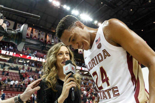 Reporter Allison Williams interview Devin Vassell of the Florida State Seminoles after the game against Louisville Cardinals at the Donald L. Tucker...