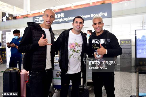 Miranda, Eder Citadin Martins and Alex Teixeira of Jiangsu Suning are seen at an airport as they depart for home on November 15, 2020 in Nanjing,...