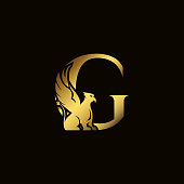 Griffin silhouette inside gold letter G. Heraldic symbol beast ancient mythology or fantasy. Creative design elements for logotype, emblem, monogram, icon or symbol for company, corporate, brand name.