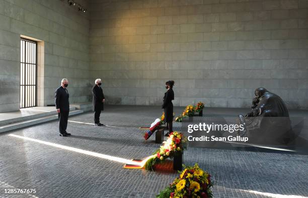 Prince Charles, Prince of Wales and German President Frank-Walter Steinmeier pause after laying wreaths at the Neue Wache memorial to victims of war...