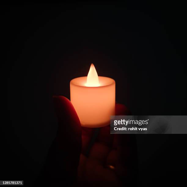 candle - mourning candles stock pictures, royalty-free photos & images