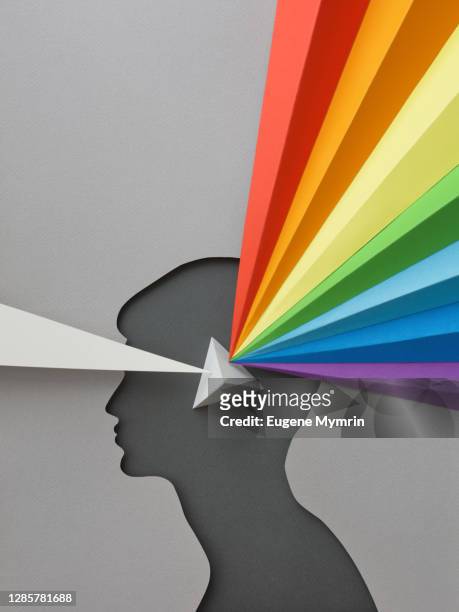 paper head with rainbow and prism - mix photo illustration stock-fotos und bilder