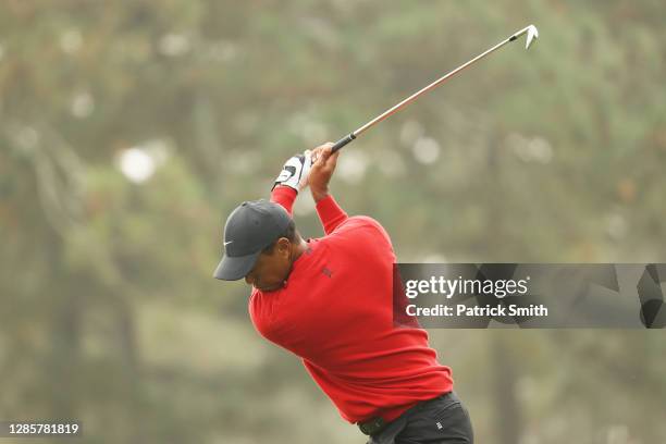 Tiger Woods of the United States plays his shot from the third tee during the final round of the Masters at Augusta National Golf Club on November...