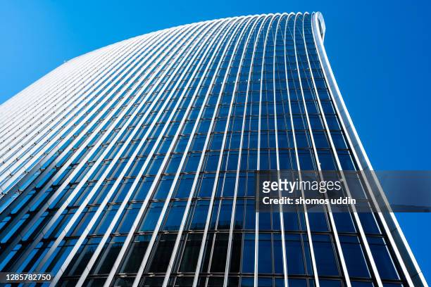 abstract of a tall modern buildings - skyscraper stock pictures, royalty-free photos & images
