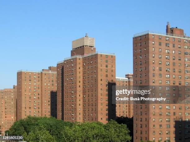 view of social housing projects in the lower east side of manhattan, new york city, usa - run down neighborhood stock pictures, royalty-free photos & images