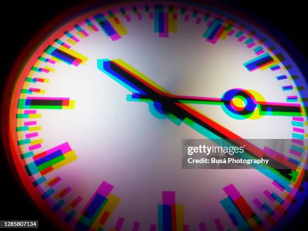 anaglyph image of a vintage metal wall clock - time of day foto e immagini stock