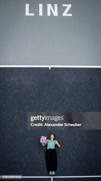 Aryna Sabalenka of Belarus poses with the trophy during the finals of the Upper Austria Ladies Linz at TipsArena on November 15, 2020 in Linz,...